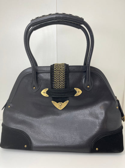 Preowned Dior black leather handbag with black suede trim and aged brass hardware, featuring a braided top handle.