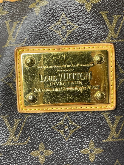 Gold hardware on front of brown monogram Preowned Louis Vuitton Galliera PM.