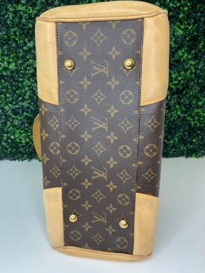 Bottom base view of a preowned Louis Vuitton Monogram Beverly GM handbag with a brown and beige color scheme, featuring the brand's iconic LV logo.