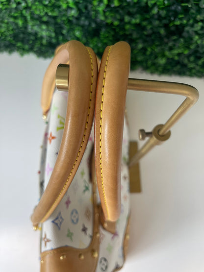 Tan leather handles of a white Preowned Louis Vuitton Multicolor Beverly GM handbag.