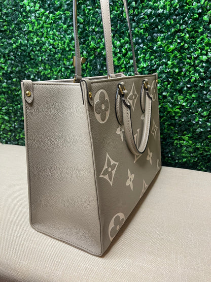 Preowned Louis Vuitton OnTheGo MM Dove/Cream